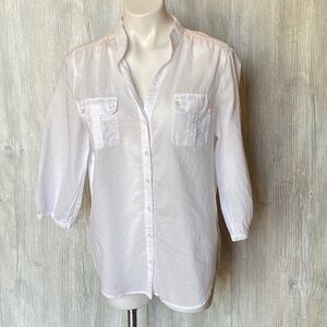 Woman’s sheer white top Chico’s size 2